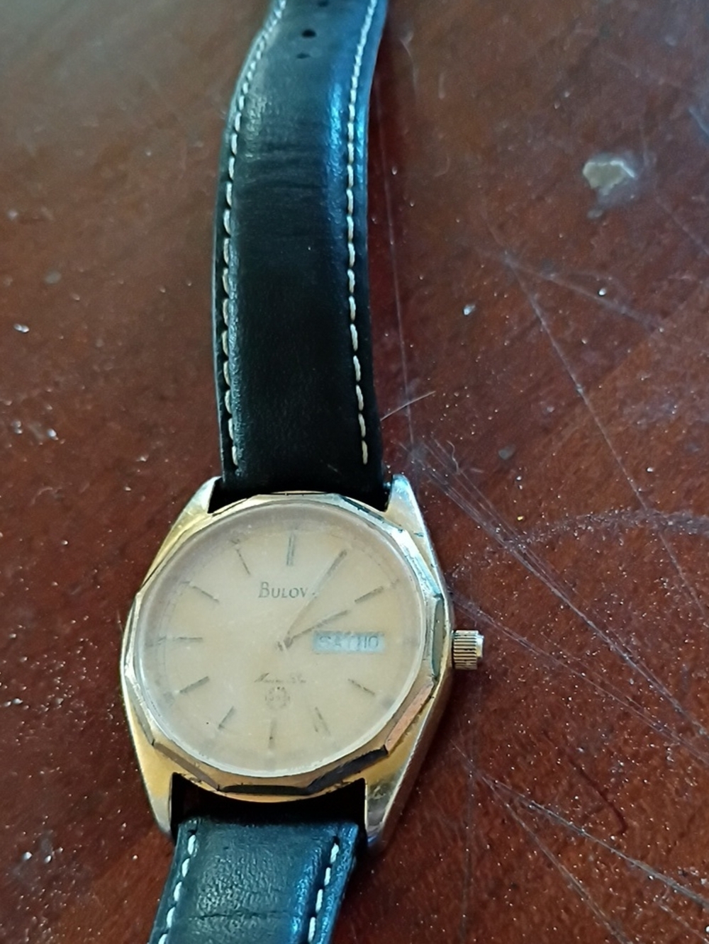 Bulova Gold-Tone Case Watch with Black Leather Strap